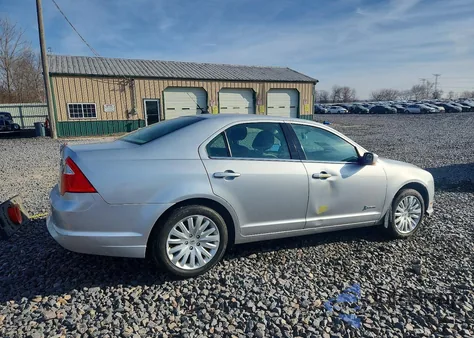 2012 Ford Fusion Hybrid z USA, uszkodzony, nr VIN 3FADP0L33CR242522